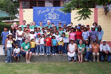 Posada de Amor orphanage Dental hygiene students Stand outside with staff and kids from Posada de Amor orphanage